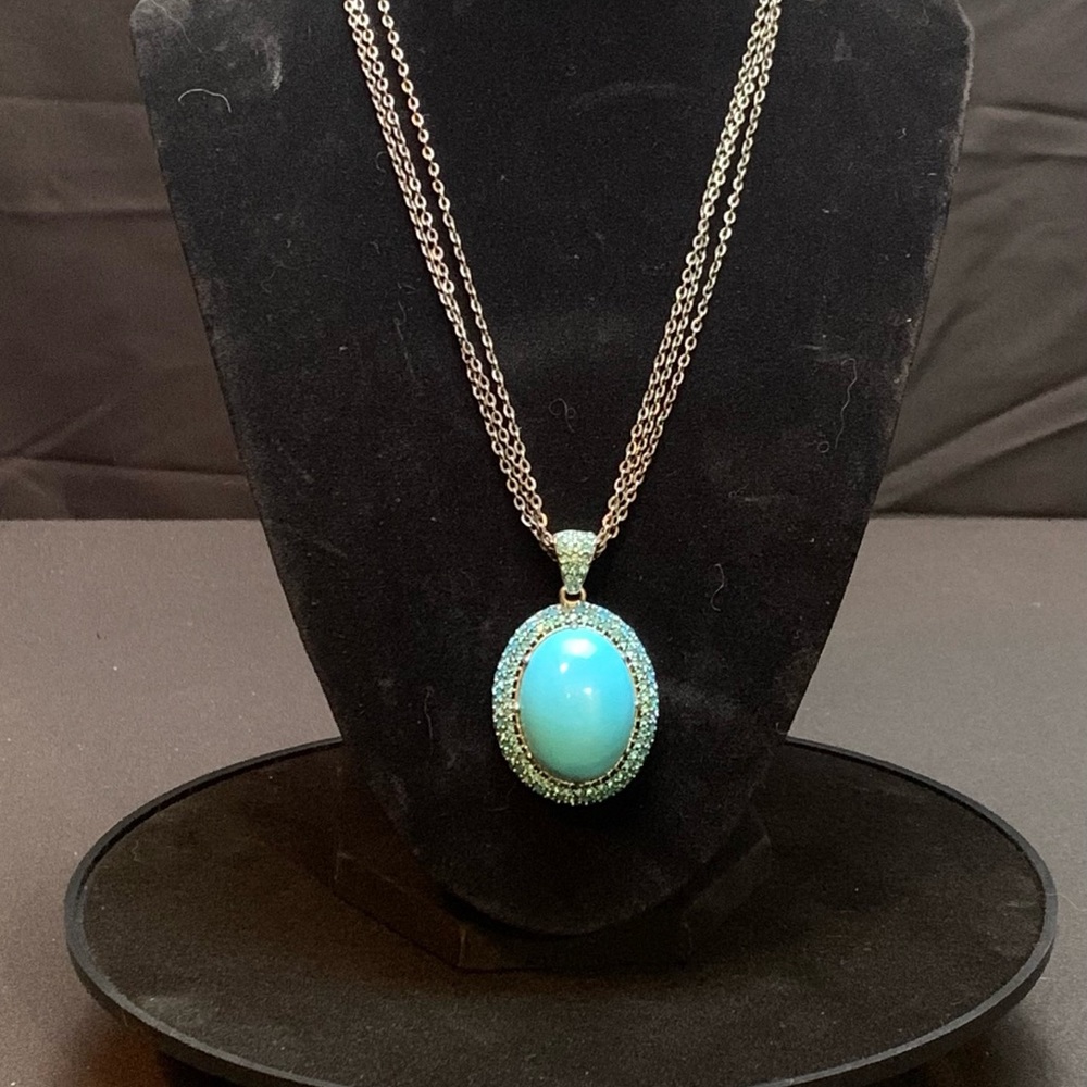 Turquoise Stone surrounded by Swarovski crystals by PLJ